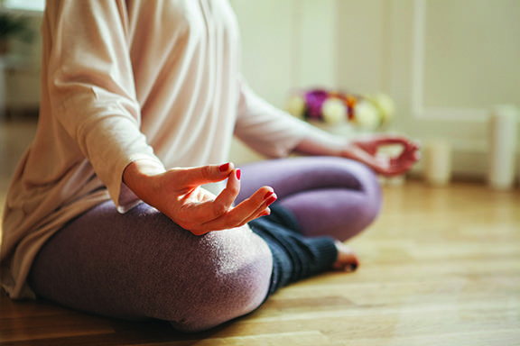 Woman Meditating in the Lotus Position