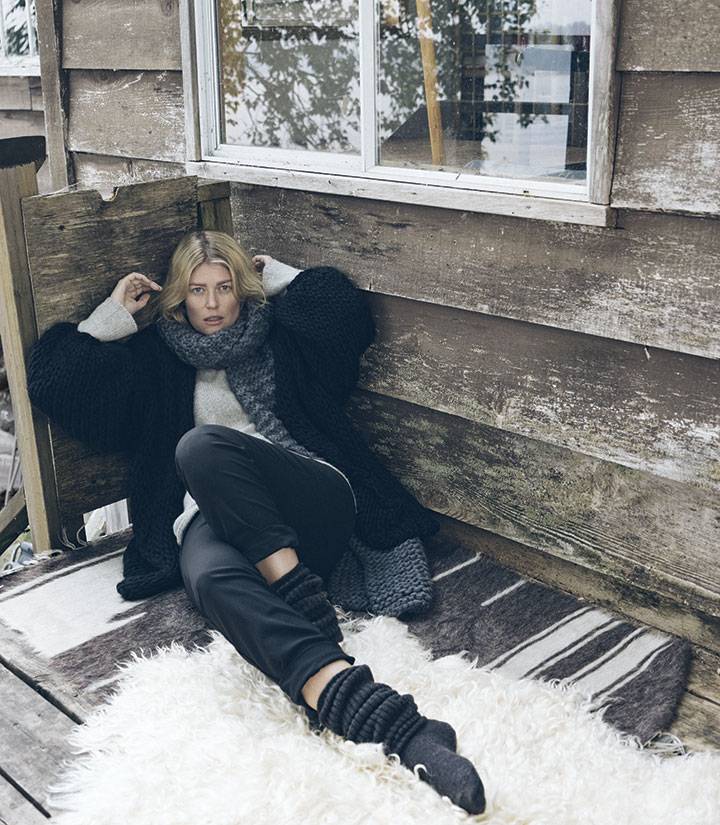 PHOTOGRAPH BY MACKENZIE DUNCAN. Grey unravel sweater (Nicole Bridger, $398); black Belief pant (Nicole Bridger, $198); black Peruvian hand-knit wool sweater ($450) and washed alpaca scarf ($200), both available at hendriklou.com or in store at Open House; grey scrunch socks (Heart & Sole Shoes, $27)