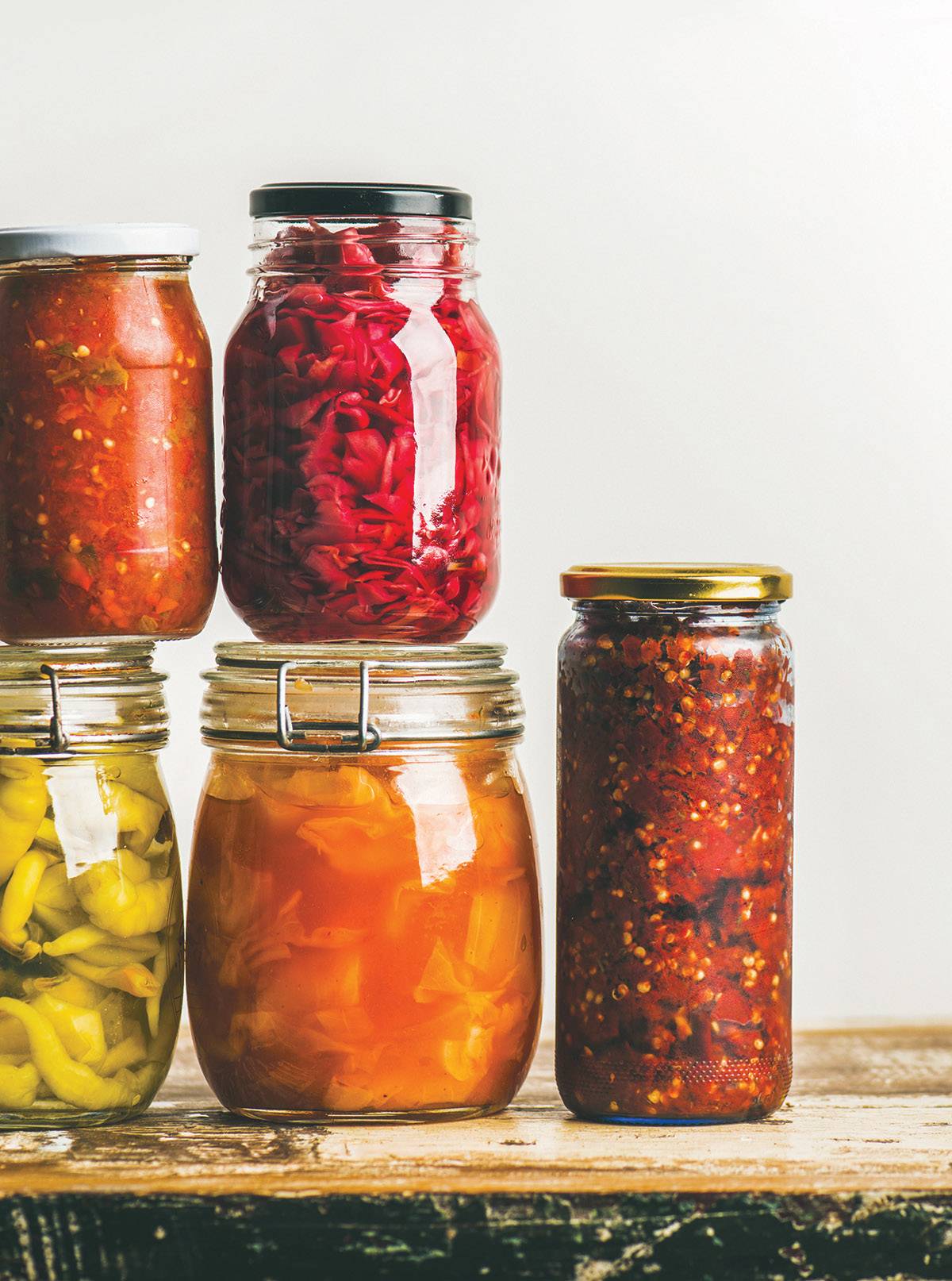 Autumn seasonal pickled or fermented vegetables in jars. Home canning