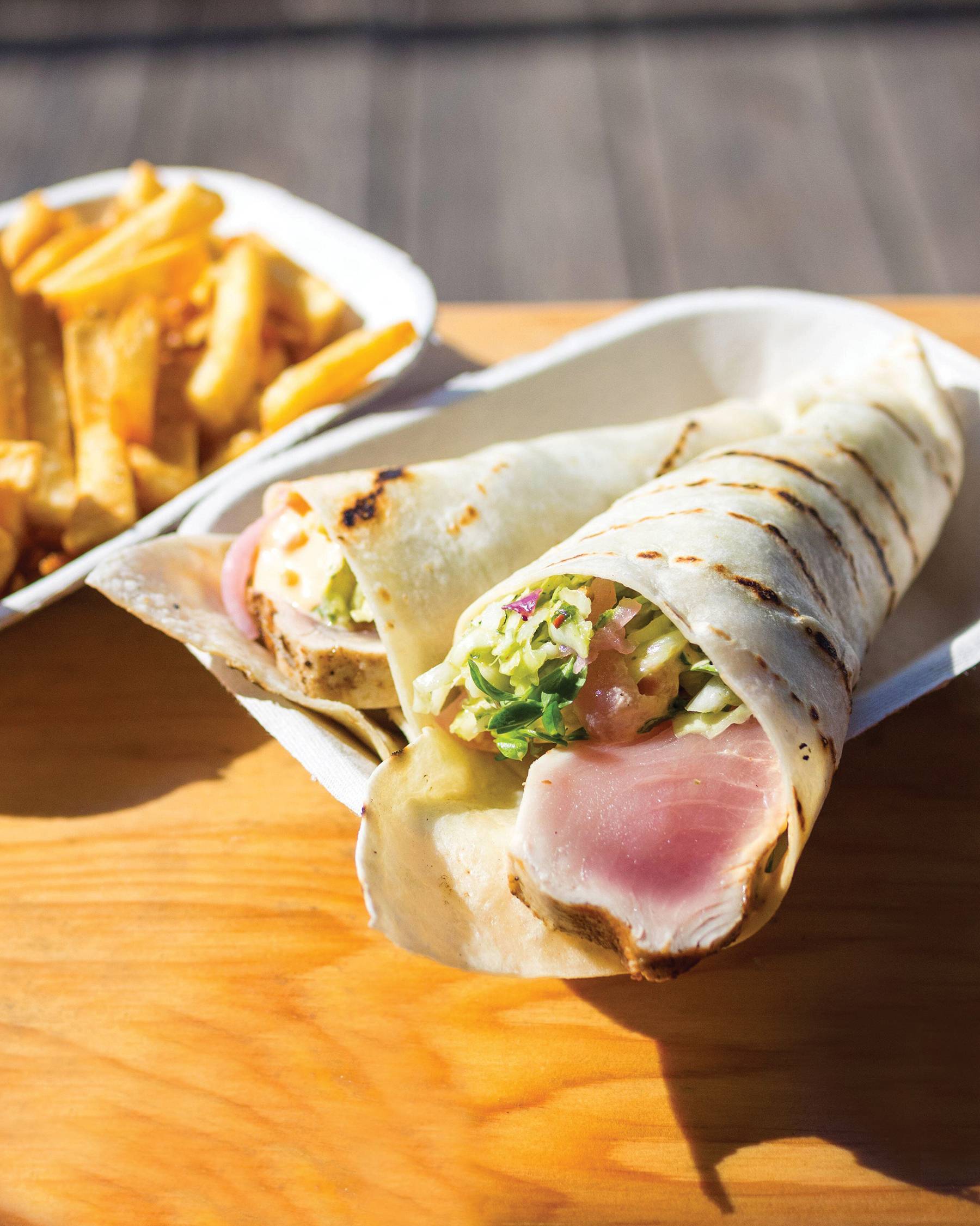 Hand-roll style albacore tuna tacos and chips from Red Fish Blue Fish Restaurant in Victoria, British Columbia, Canada.