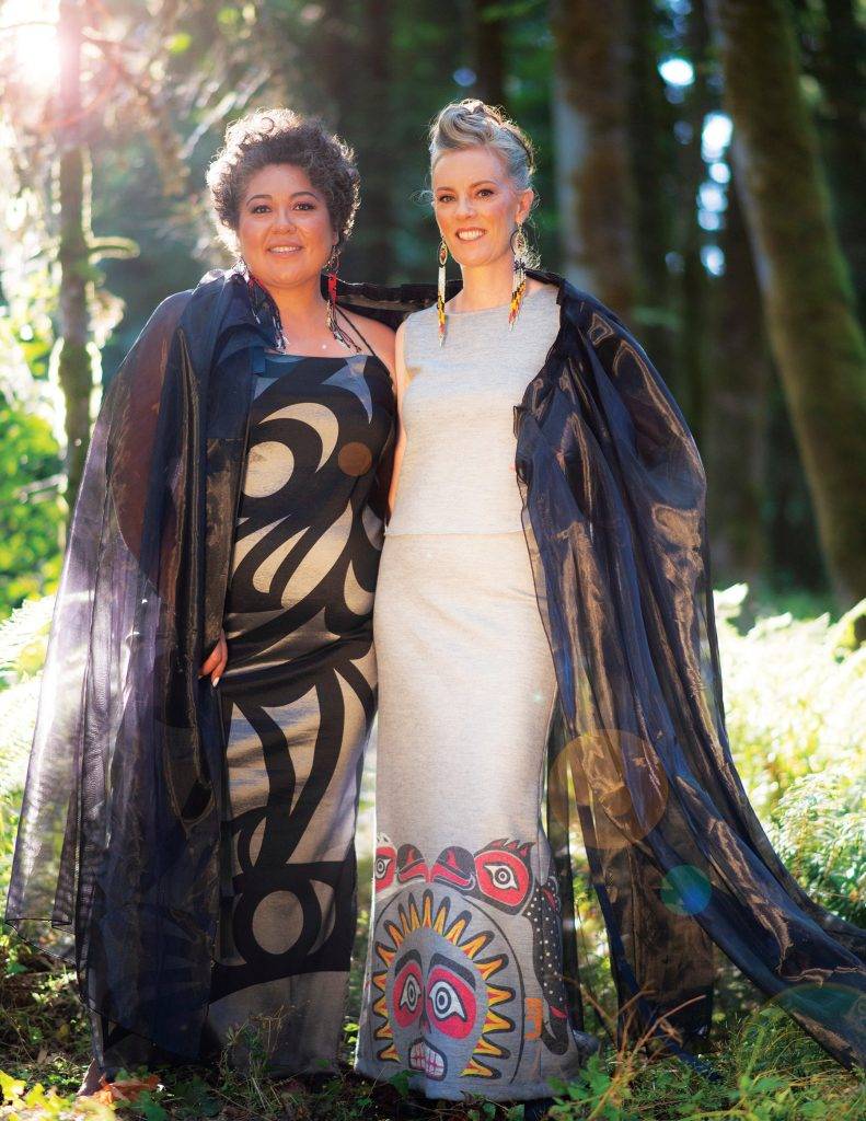 Sophia Seward-Good (left) and Aunalee Boyd-Good in their own fashion designs for Ay Lelum.
