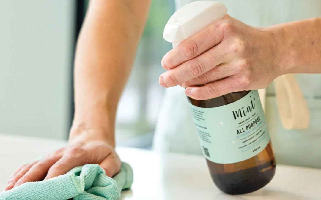 using environmentally friendly spray cleaner to clean a counter top